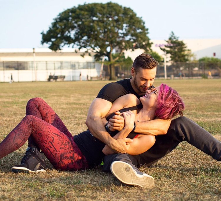 A guy with a press and a girl